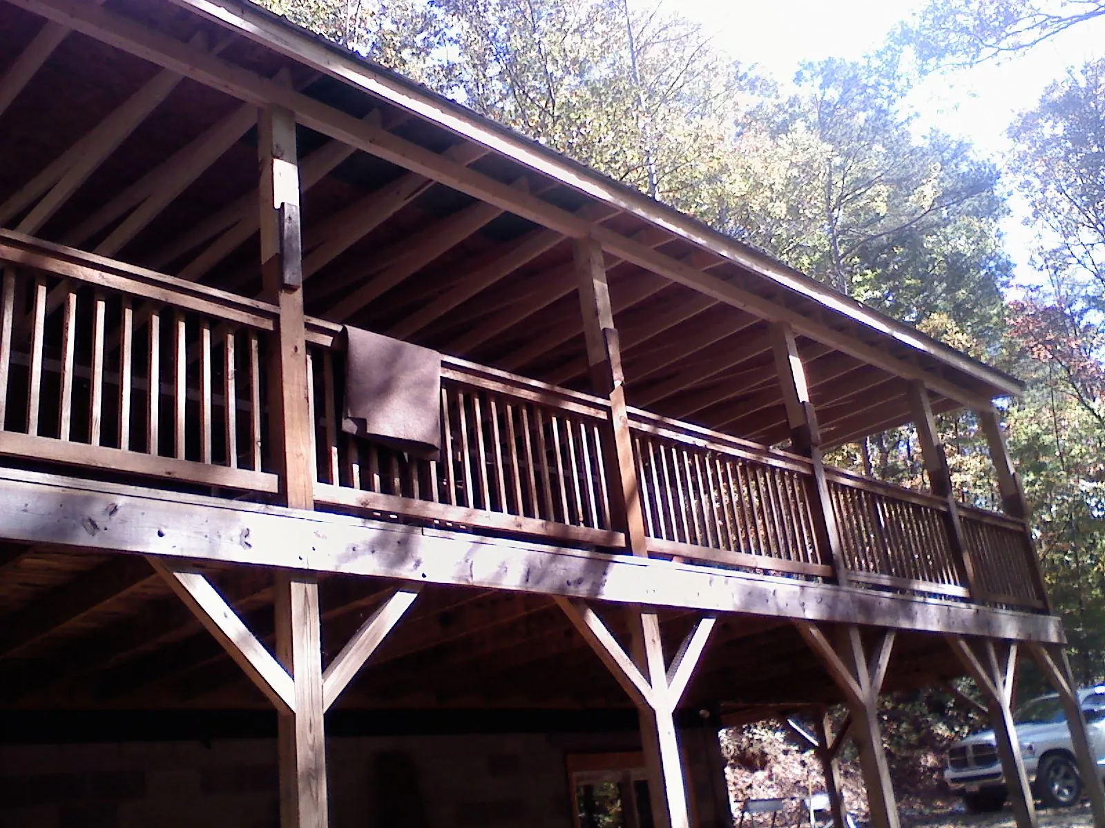 Timber framing under a new elevated porch and deck — Roof Leak Repair in Winlock by Roofing Brothers